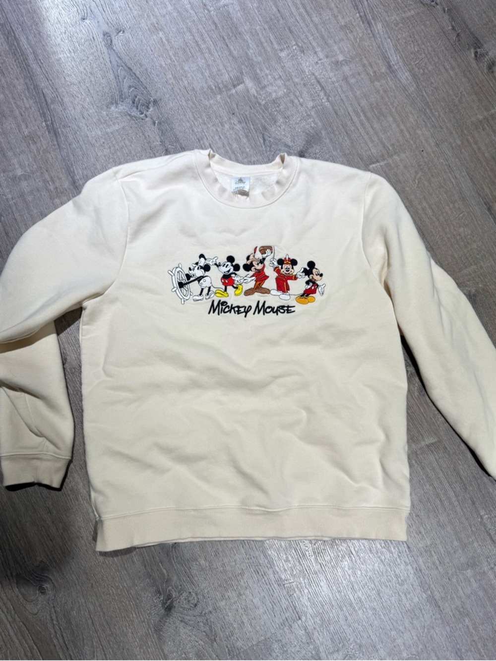 Disney Cream Crewneck Sweatshirt with Mickey Mouse Lineup Graphic